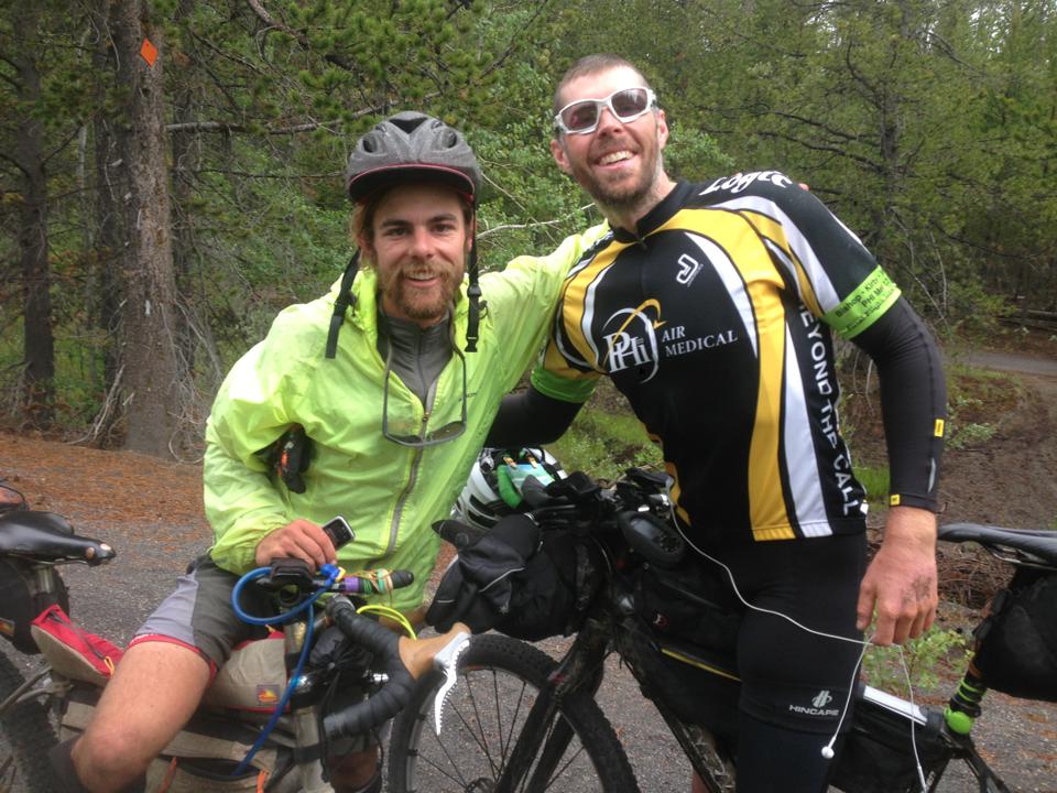 Tour Divide northbound leader Cjell Money and yo-yo rider Billy Rice cross paths near Island Park, Idaho on Tuesday. Money is reportedly planning to stop at the U.S./Canada border due to extensive flood damage in Alberta. 